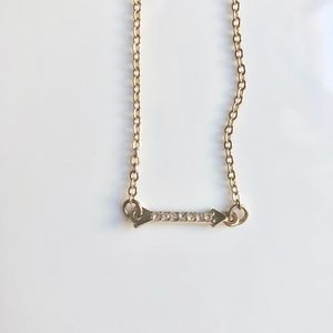 URBAN OUTFITTERS: GOLD/CRYSTAL ARROW NECKLACE